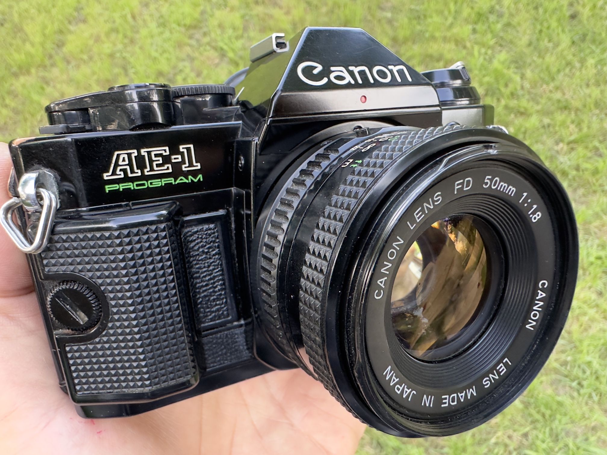 Black Canon AE-1 Program + 50mm 1.8 FD lens 35mm film camera