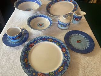 Vintage Sango Pisces 65 piece dinnerware set with matching silverware
