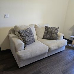 Beige Upholstered Loveseat / Sofa - Includes 2 Accent Pillows