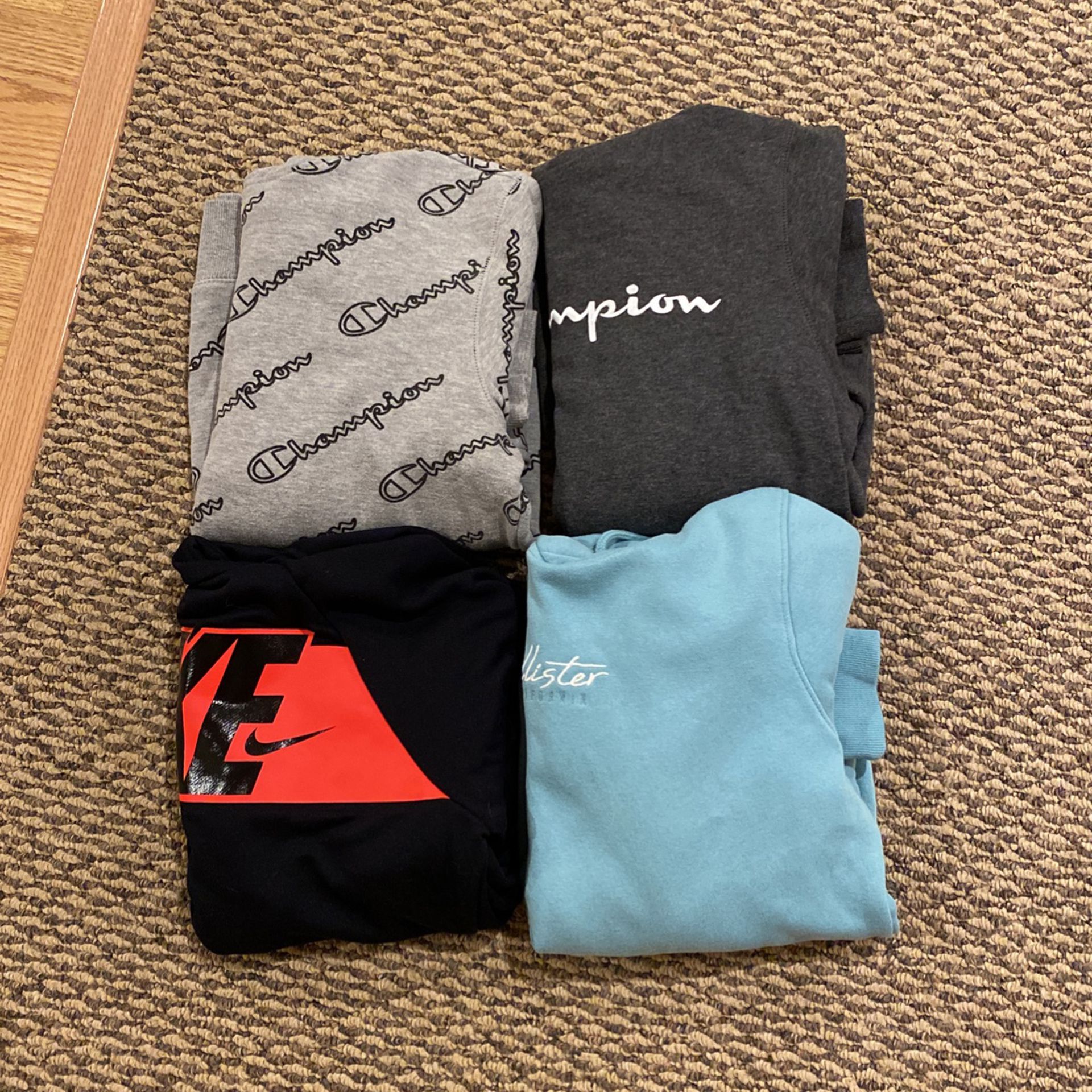 Hoodies (Youth Extra Large, 1 Nike, 2 Champion & 1 Hollister)