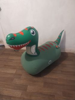 Inflatable rocking jumpy dinosaur