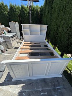 Full white bed frame with mattress
