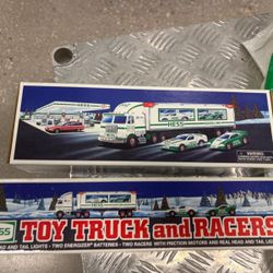1997 Hess Toy Truck and Racers - New in Box in the original box and original plastic bag … $40 each
