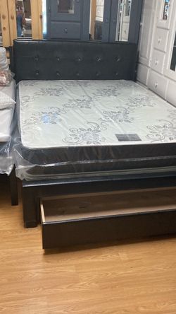 Black queen size storage bed frame ($480)