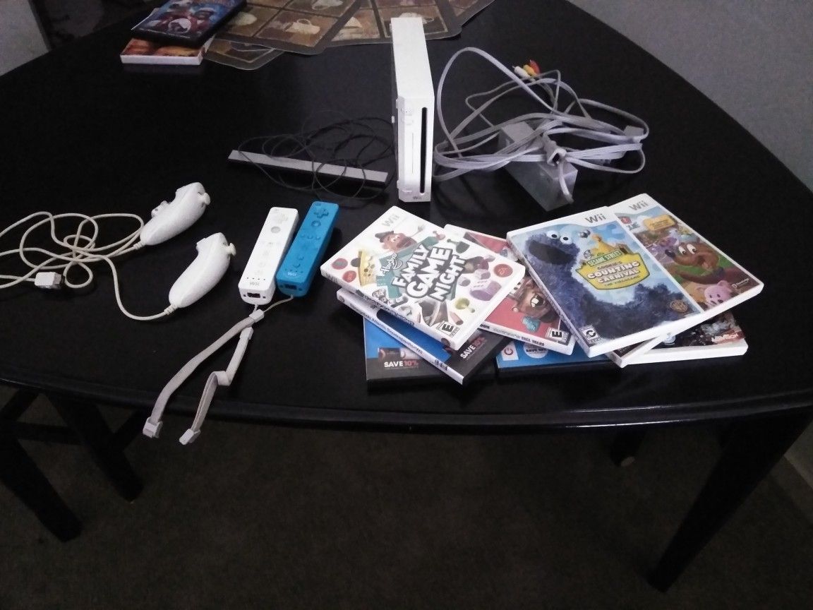 Nintendo Wii & 9 games.
