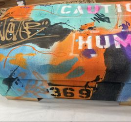 Graffiti style hand painted ottoman
