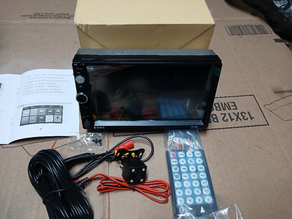 Double Din MP5 Stereo, New In Box. Has back up cam, Remote Comtrol, BT, USB, Micro SD, Aux, No CD Player.All Wiring, Protective Film Still On Screen.