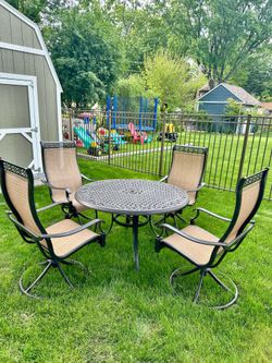 Patio set, aluminum table with 4 swivel chairs, only used for 2 month, like new, delivery available for extra cost