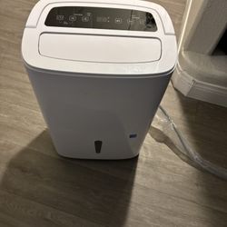 Energy Star Dehumidifiers with Drain Hose, Handle, Auto Defrost and Self Drying Features 