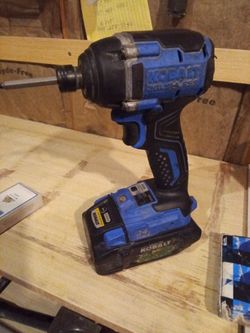 Kobalt 24 volt Max Brushless Variable Speed 1/4" Impact Driver w/2 Batteries and Charger