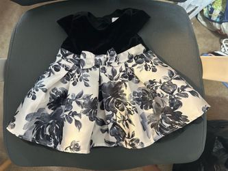 Box of baby girl clothes