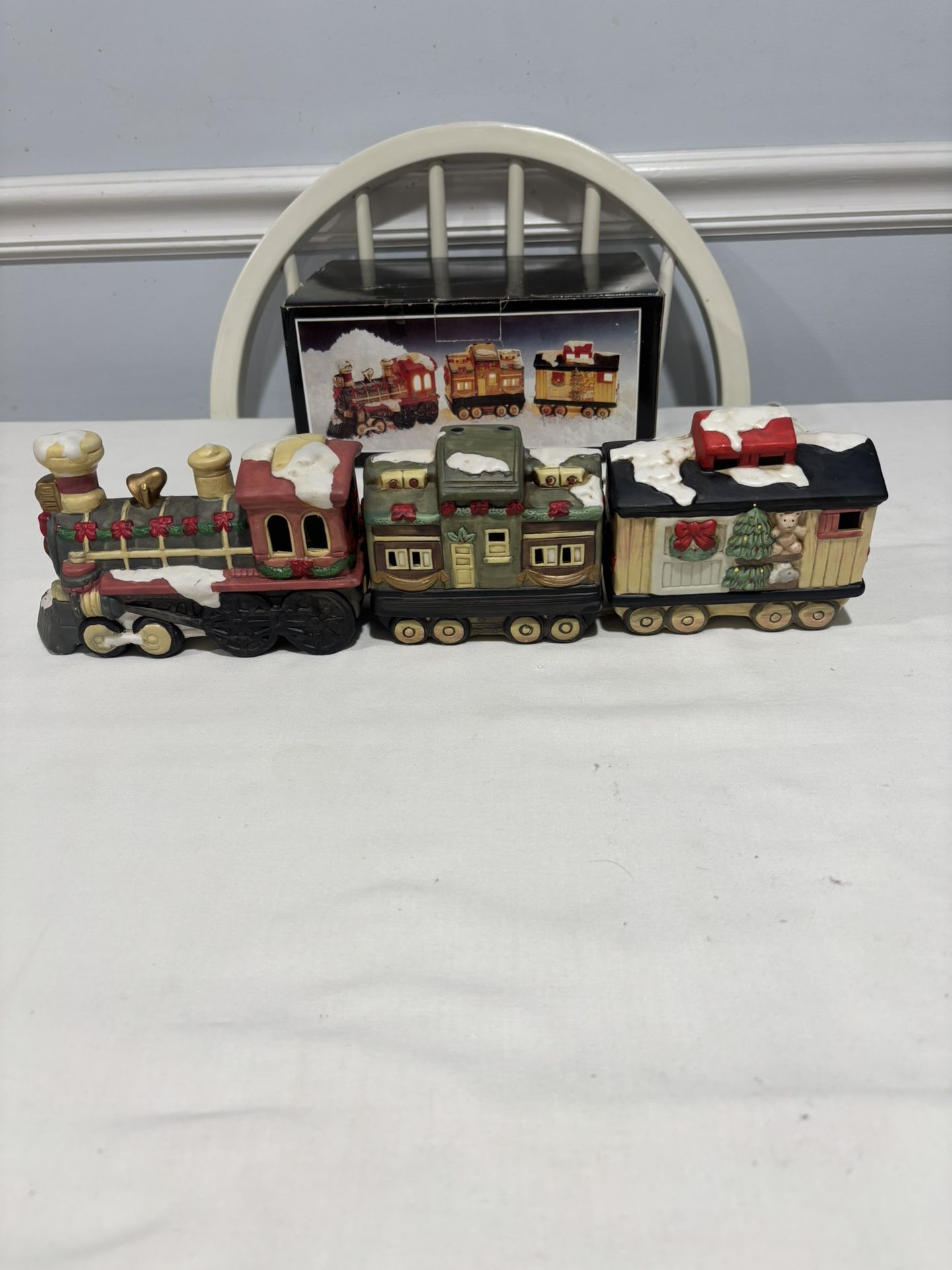 BRAND NEW PORCELAIN 3 PIECE LIGHTED TRAIN SET.  $50.00 DOLLARS. 