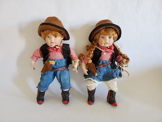 Swan Collection Cowboy And Cowgirl Porcelain Dolls
