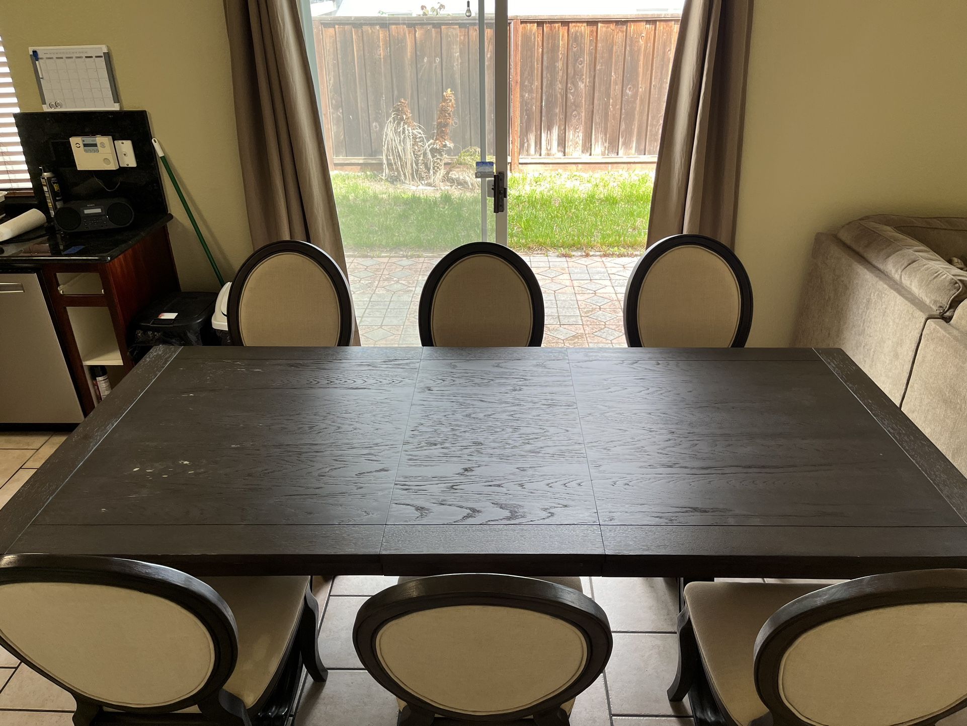 Used Long Dining Room Table with Leaf and 6 Cushioned Chairs $350/OBO