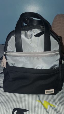 Diaper bag and baby carrier