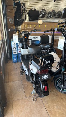 seated electric scooter and moped-style/ payment available