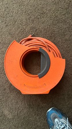 Extension cord with cord holder