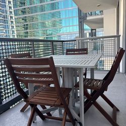 Outdoor foldable dining table with 4 chairs