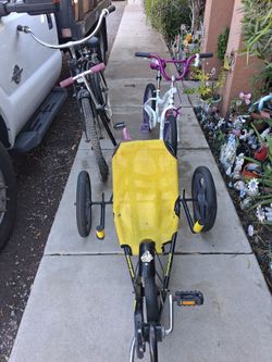 Three bicycles and a scooter
