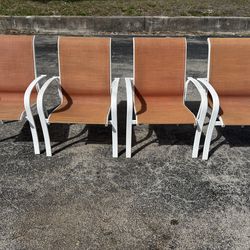 For white and brown outdoor patio chairs
