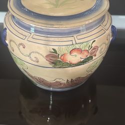 vintage Chinoiserie porcelain rice jar with a lid.