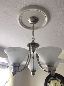 In new condition 5 light chandelier