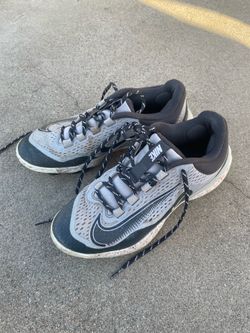 Nike grey and white baseball metal cleats size 7