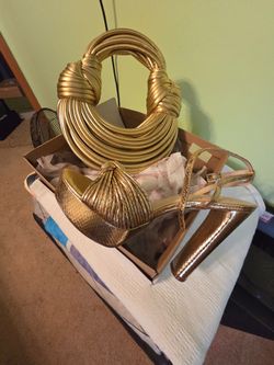 Gold purse and shoes