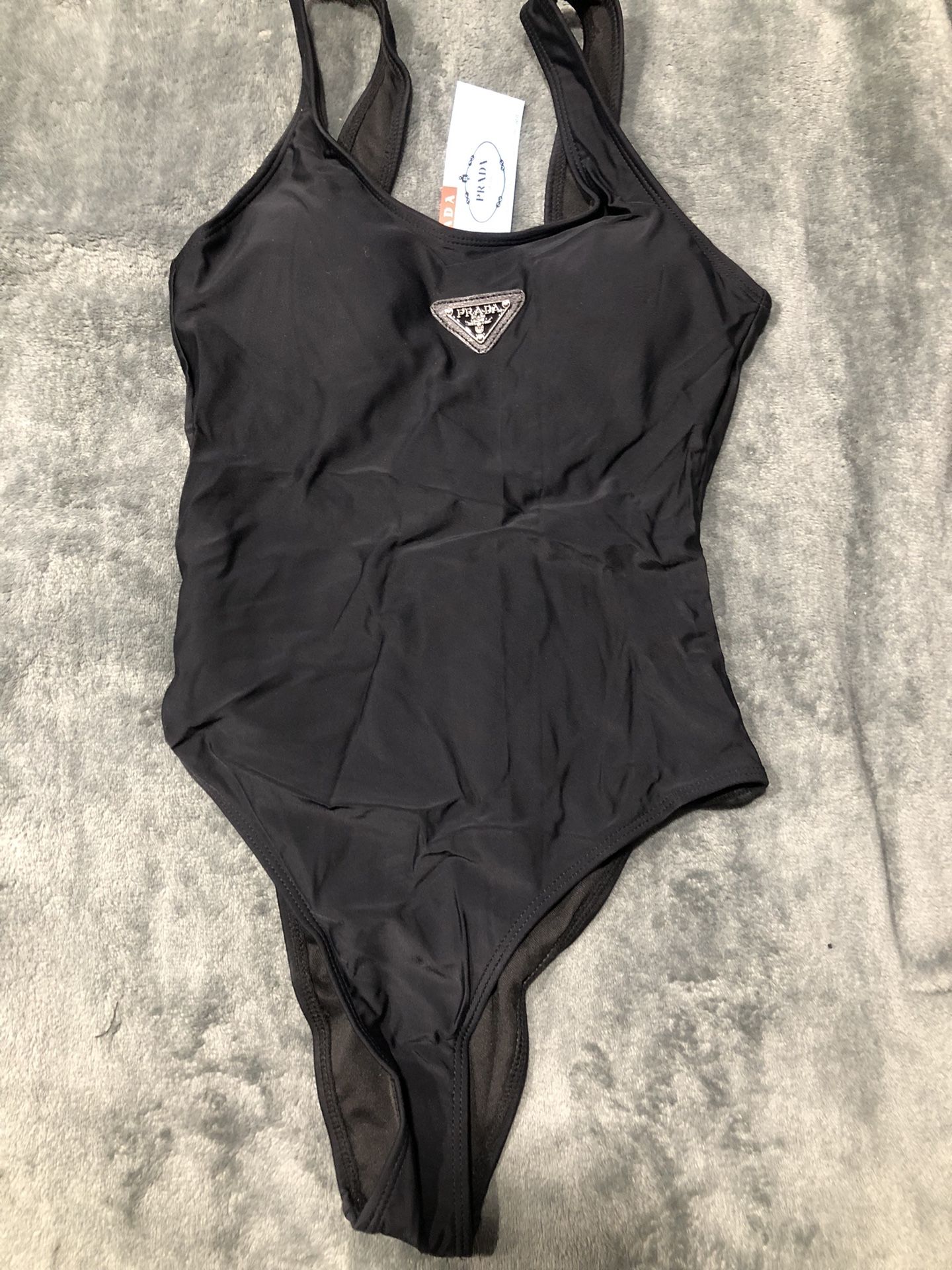 Woman’s Black Swimsuit.             S,m,l,xl