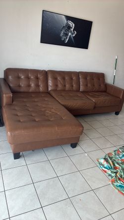 A leather brown couch