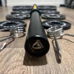 Beautiful BRAND NEW  Olympic Equipment: Bar And Full Set Of Weight Plates. Total Of 290 lbs