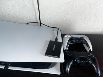PS5 with controllers,games and storage