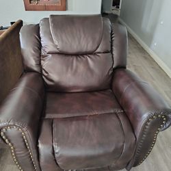Leather / vinyl rocking recliner like new.