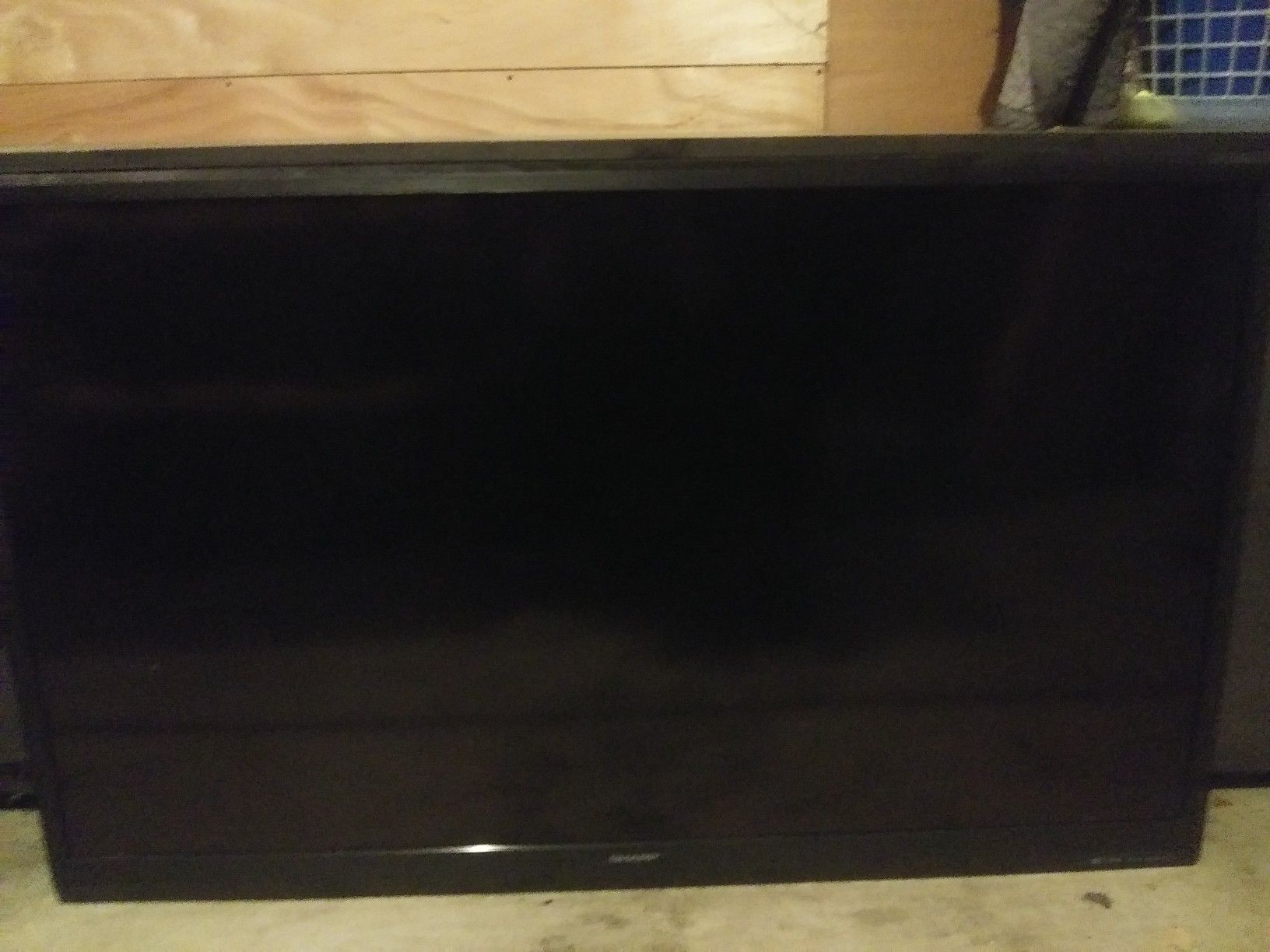 55 Flatscreen TV Aquos Sharp TV with very strong Wall mount