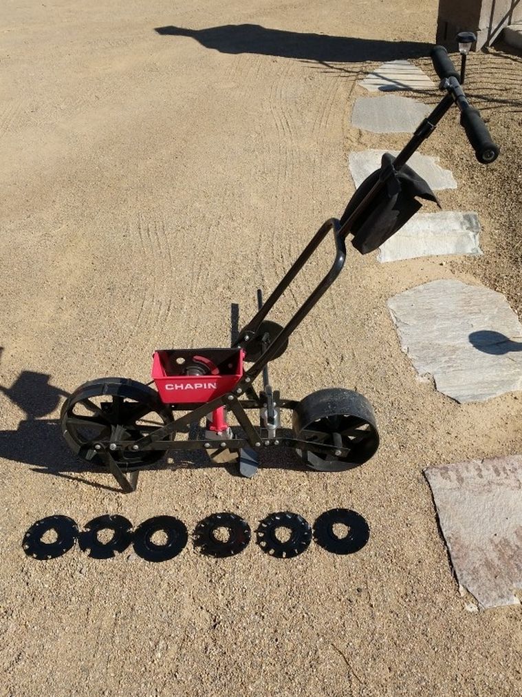 Chapin 8701B Garder push seeder w/ 6 multi combination seed disk new conditions never used for planting look at all pictures for more detail in price