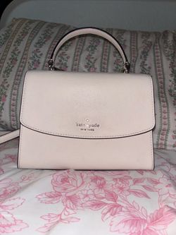White Kate spade purse.