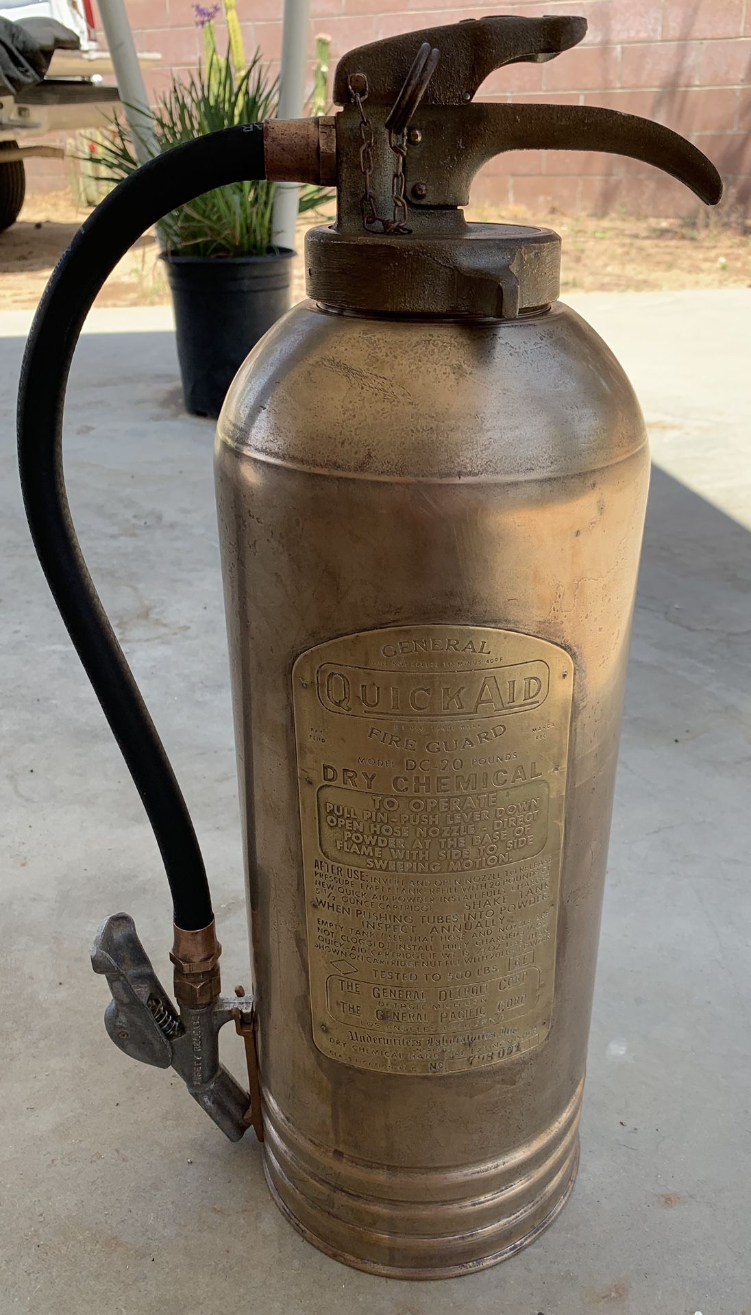 Vintage brass fire extinguisher