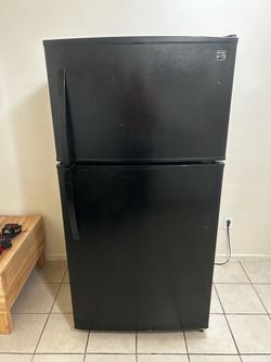 Used Kenmore refrigerator - black