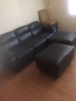 Sectional black sofa it breaks down