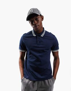 ASOS DESIGN tipped pique polo shirt in navy.