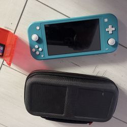 Blue Nintendo Switch With Protecting Case And 2 Games 
