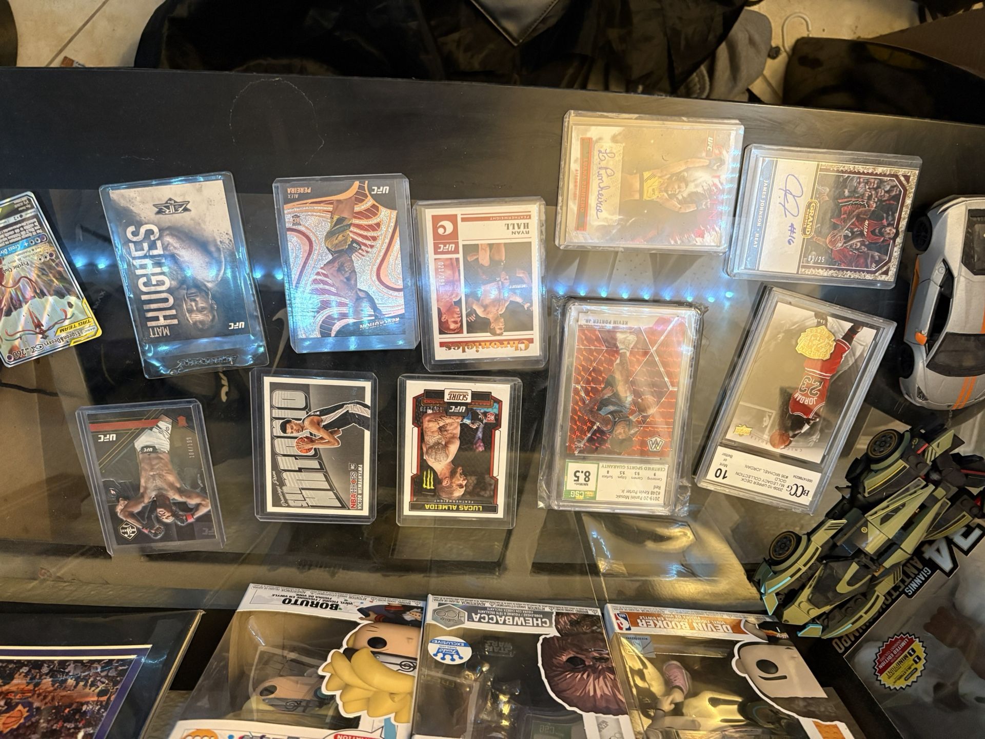 Basketball, MMA, And Pokémon Cards 