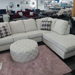 Cream l shaped sectional with pillows available in grey light gray all in stock