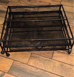 black metal rolling under-bed shoe storage rack