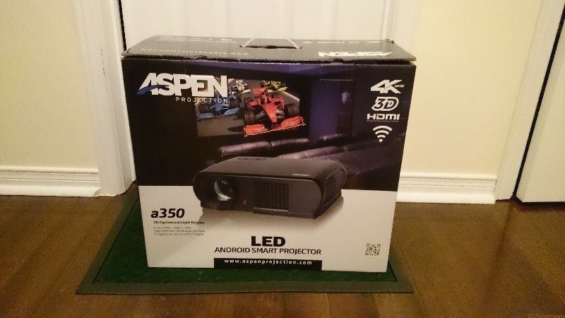 Brand new 3D 4K projector with surround sound system and remote controlled 72in screen.