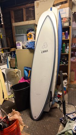 Al Merrick 7’6” tuff lite tri fin