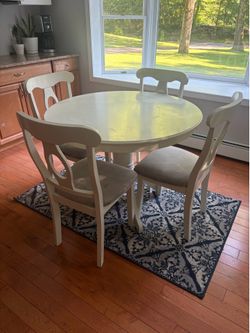 Dining room table with four chairs