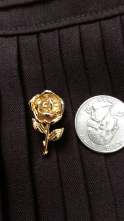 Tiny gold colored rose pin lapel