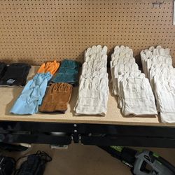 Industrial Gloves, lot of 29 pair, new.  Industrial 100% cotton work gloves 22 pair, leather welding heat holding gloves 1 pair, HD leather work glove