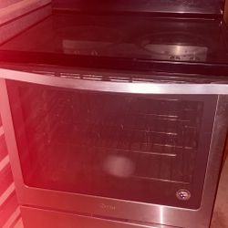 Electric Stove And Stainless Steal Fridge 